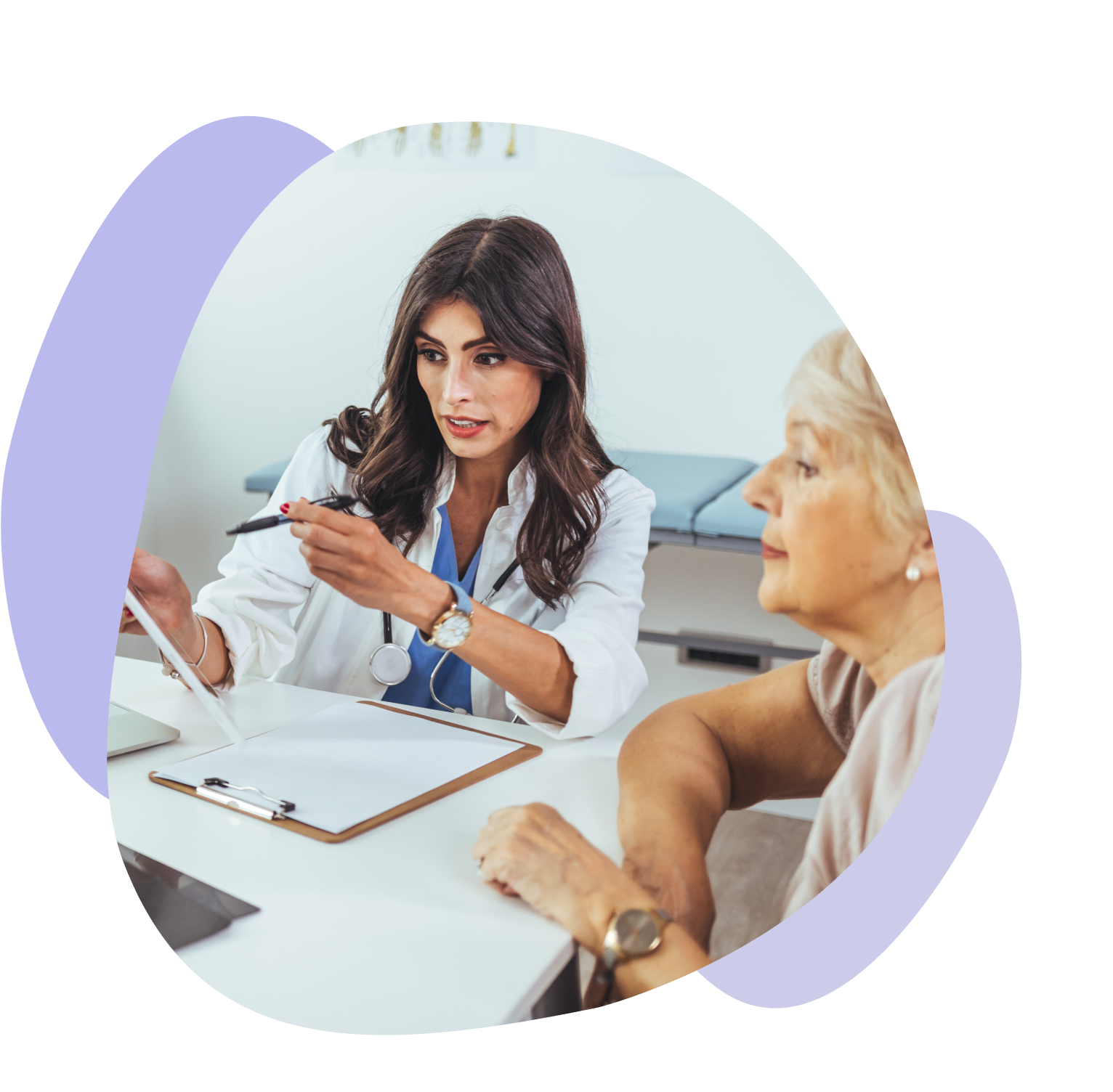 Female doctor discusses lab results with an older female patient at a desk