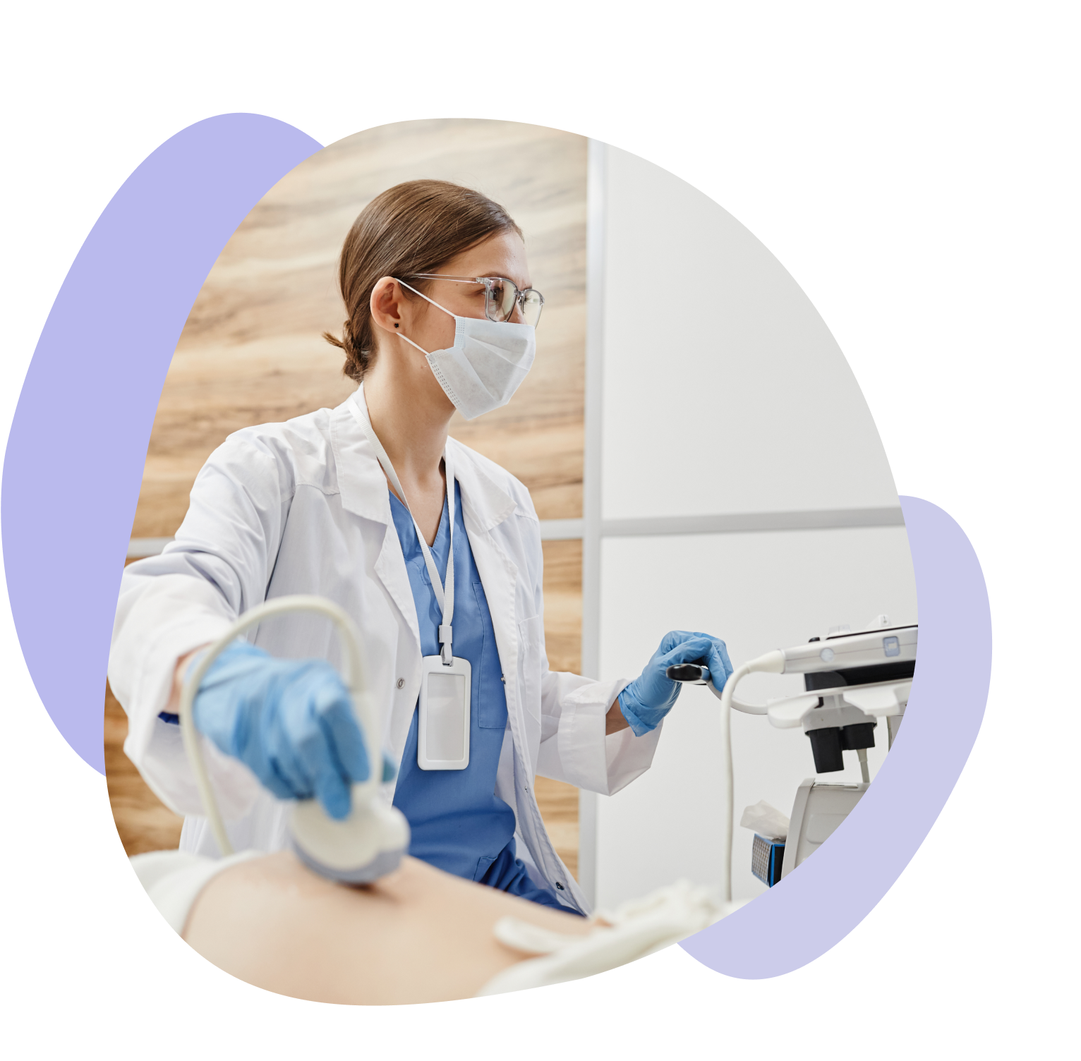 Side view portrait of female doctor using ultrasound machine and wearing mask while examining pregnant woman in clinic